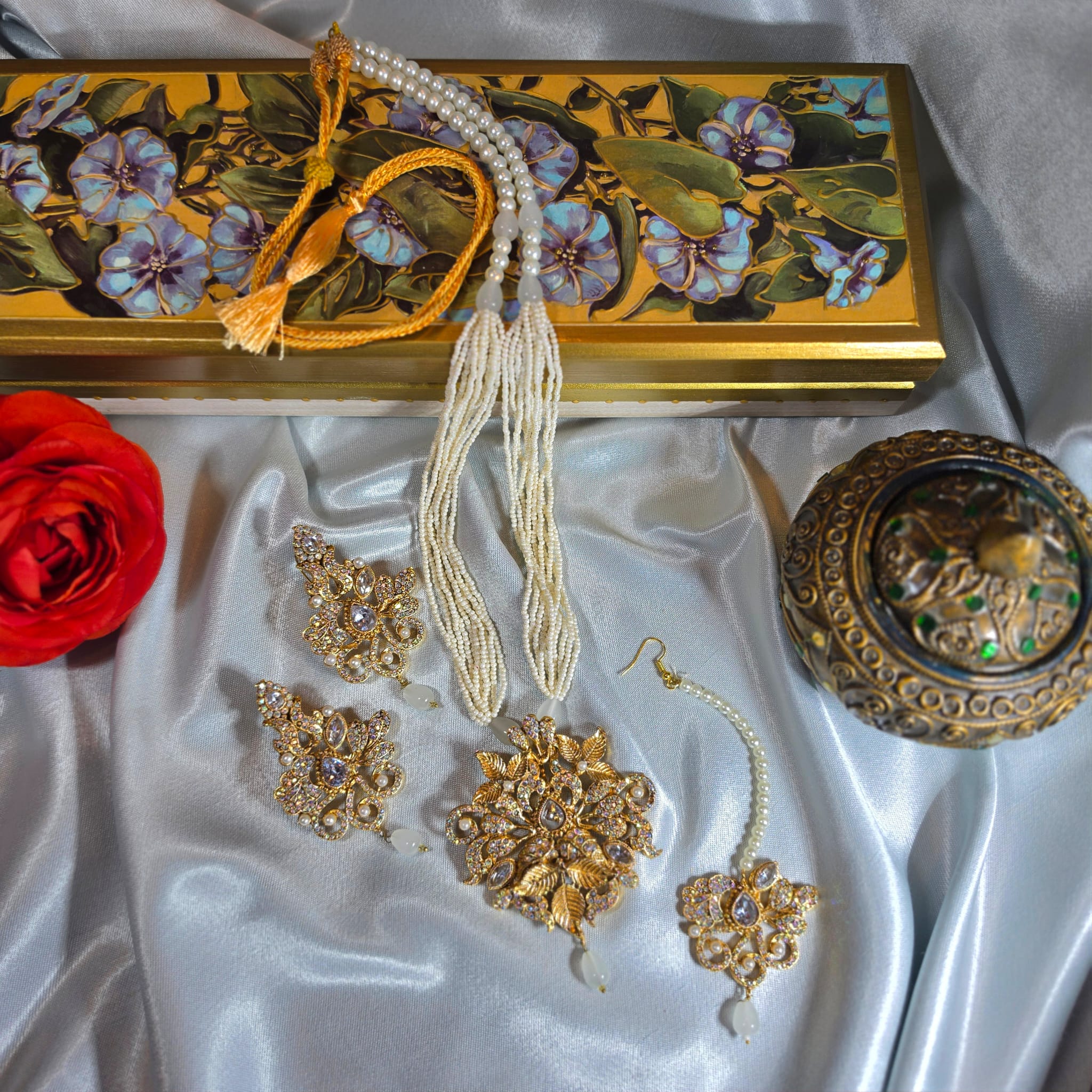 Gold with clear stone Mausam